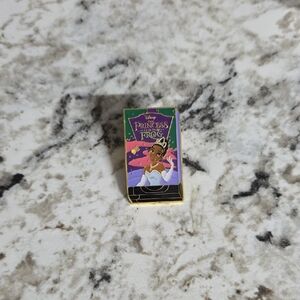 Disney Princess and the Frog VHS Enamel Pin with Purple and Gold
